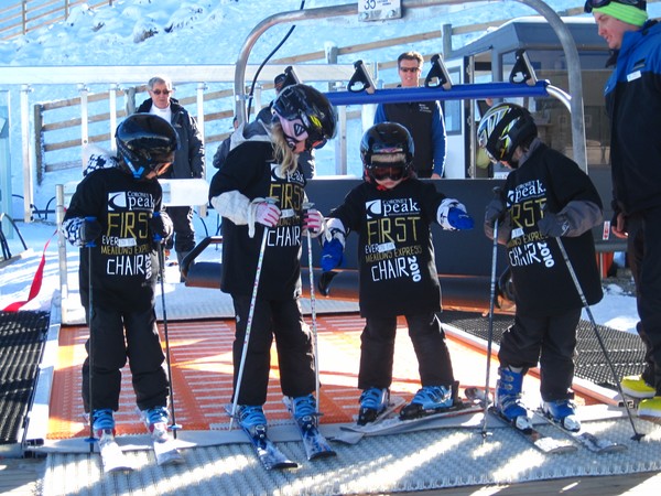 Georgie ffiske (granddaughter of John Davies) Olivia Coddington, daughter of NZSki CEO James Coddington, Johnny ffiske (grandson of John Davies) and Keir Roberts from Arrowtown are the first to board the new Meadows Express as John Davies and James Coddin